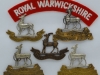 The Royal Warwickshire Regiment badges.