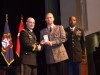 Major General John S. Kem, Provost of the Army University and Deputy Commandant of the Command and General Staff College presents the International Graduate Badge to German Major Jan Feldman June 8 at the p