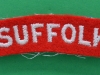 The Suffolk Regiment cloth shoulder title.