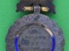 Medaille-Militaire-For-Valeur.-Model-1870-med-ensartet-og-haengslet-trofae.-28x46-mm-reverse