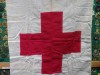 Røde Kors Taske sanitetstaske med flag og armbind. Har sandsynligvis været brugt af eller ved den Danske Brigade i Sverige 1943-45
