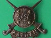 Cap badge, 5th Battalion, 14th Punjab Regiment, post-1947.White metal badge with the initials, FF, on a shield (dhal) over crossed Khyber knives (choora) 36x32 mm