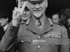 South African statesman and military leader Jan Christiaan Smuts (1870 - 1950) gives the V for Victory sign at the Guildhall in London, 1944. Mr Curtin of Australia and Peter Fraser, Prime Minister of New Zealand, had been given the Freedom of the City in a ceremony at the Guildhall, and Smuts was in attendance. (Photo by Keystone/Hulton Archive/Getty Images)