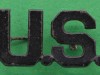 9-20.-Block-US-insignia-for-enlisted-men-beginning-in-1903.-31x17-mm