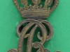 Christian IX Rex påloddet krone og nål og anvendt som brosche. Efter sigende brugt på epaulette ved et tysk kyrasserer regiment hvor Chr IX var æresoberst.  Meget tyk, 4 mm. 30x43 mm