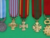 1, Médaille de  Chevalier de la Légion d'honneur, 3ème République, 2, Croix de guerre 1939-1945 (1939), 3, Croix de guerre des Theatres operations exterieurs (1921), 4, Croix de la Valeur militaire (1956). 5, Medalje Coloniale 1893