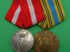 Fortjenst- og Gaza Medalje til Kaptajn Niels Erik Grauvgaard Olsen, Hærens Materielkommando 1933-2021  (1)