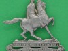 CO2664 -35-x-31mm-The United Provinces Light Horse was formed in 1904 from the amalgamation of the Allahabad Light Horse, the Cawnpore Light Horse, the Gorakhpur Light Horse, the Ghazipur Light Horse and the Oudh Light Horse.  The figure of the horsemen is similar to an equestrian statue of Lieutenant-General Sir James Outram (1803-1863) in Calcutta, sculpted by John Henry Foley. Outram distinguished himself in the operation to relieve the besieged city of Lucknow during the Indian Mutiny (1857-1859).