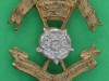Cap badge, 1st Duke of York's Own Skinner's Horse, 1922-1947 Bi-metal badge with central rose over crossed lances, with a crown between the lance-heads-25-x-31mm-1