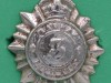 Cap badge, 3rd Madras Regiment, 1941-1945 White metal badge in the form of a rayed star with a King's Crown making the top point, with the regimental number, '3', within a circlet bearing the regimental title, 'Madras Regiment', on blue cloth ground.-28-x-30mm-1