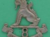 Cap badge, 8th Punjab Regiment, 1922-1947 White metal badge in the form of a chinthe seated above the regimental number, '8', with a scroll below bearing the title, 'Punjab Regiment'.-40-x-42mm-1